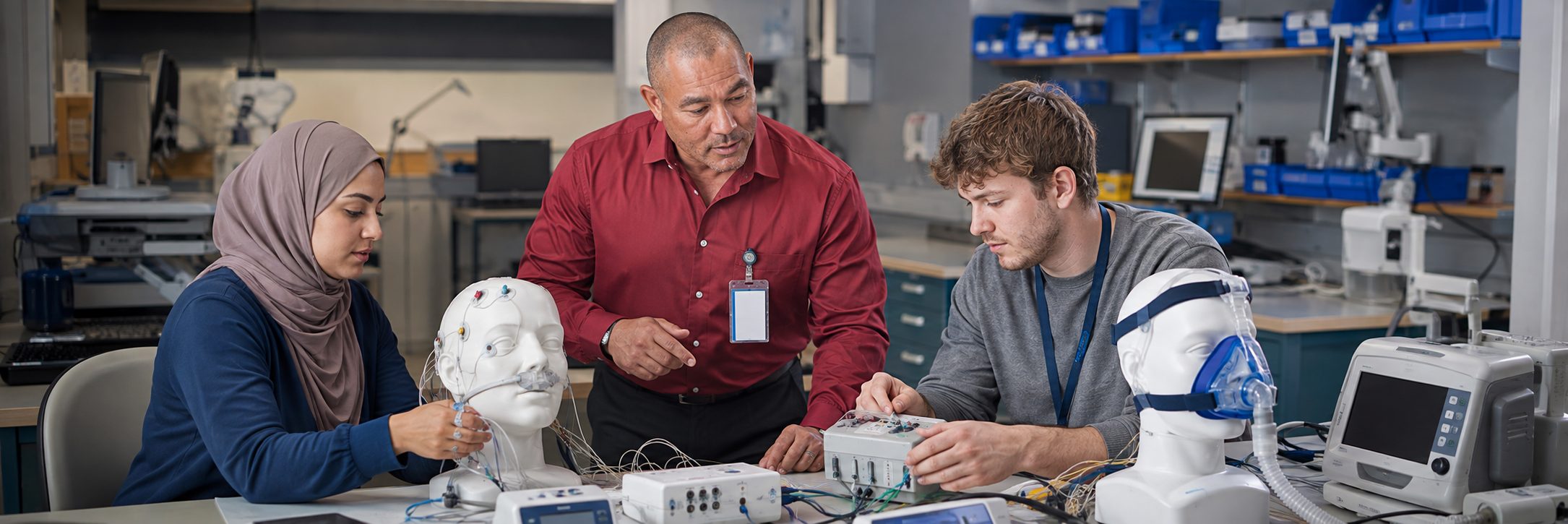 Operating room surgical light inspection and service | BiomedRx HTM services HTM technicians inspecting operating room surgical lights during scheduled service